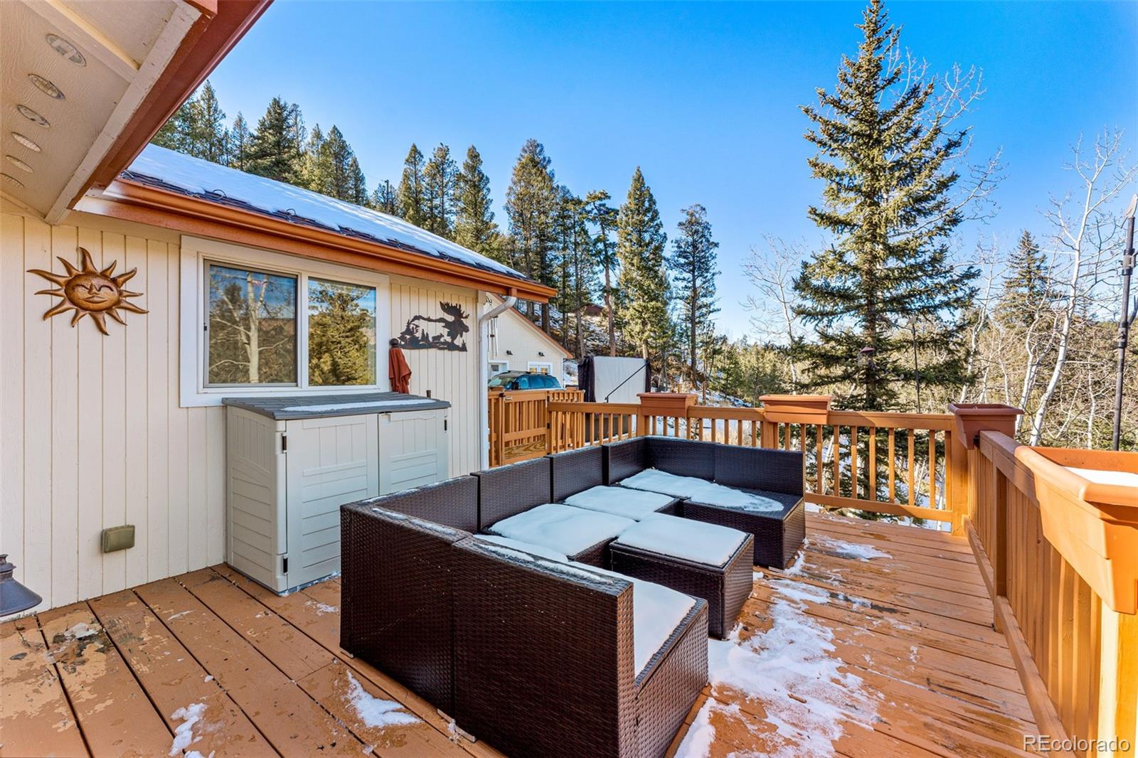 33782 Nova Road Pine, CO 80470 - Photo 26 of 50 a view of a chairs and tables in the balcony
