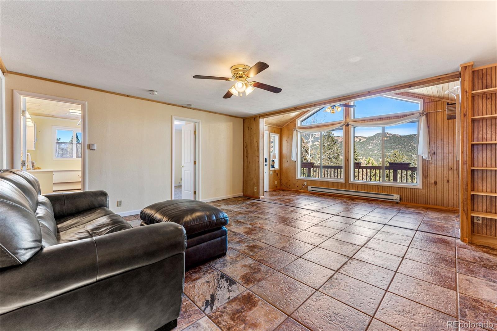 33782 Nova Road Pine, CO 80470 - Photo 3 of 50 a living room with furniture and a large window