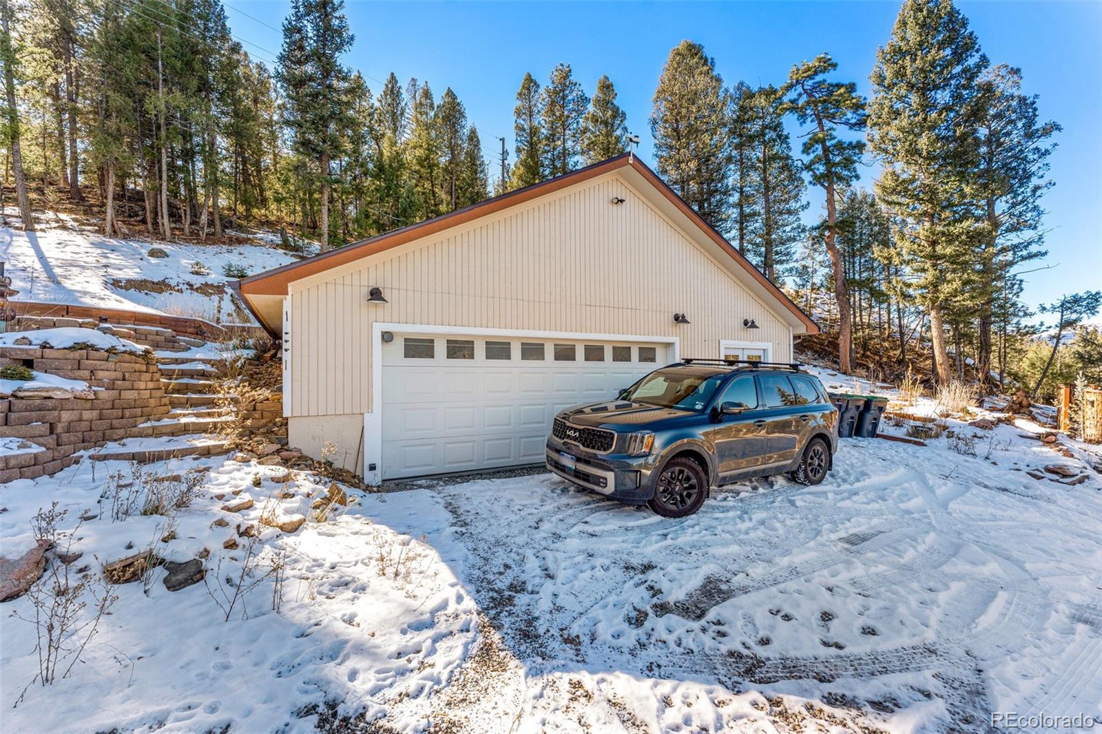 33782 Nova Road Pine, CO 80470 - Photo 33 of 50 a view of a car in front of a house