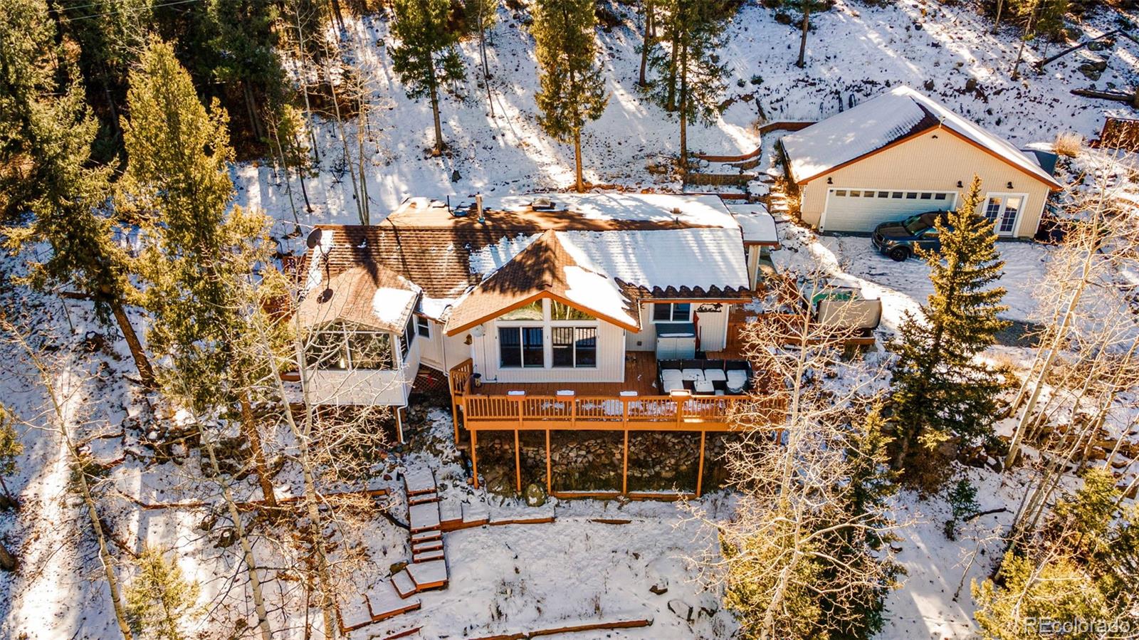 33782 Nova Road Pine, CO 80470 - Photo 38 of 50 an aerial view of a house with a yard