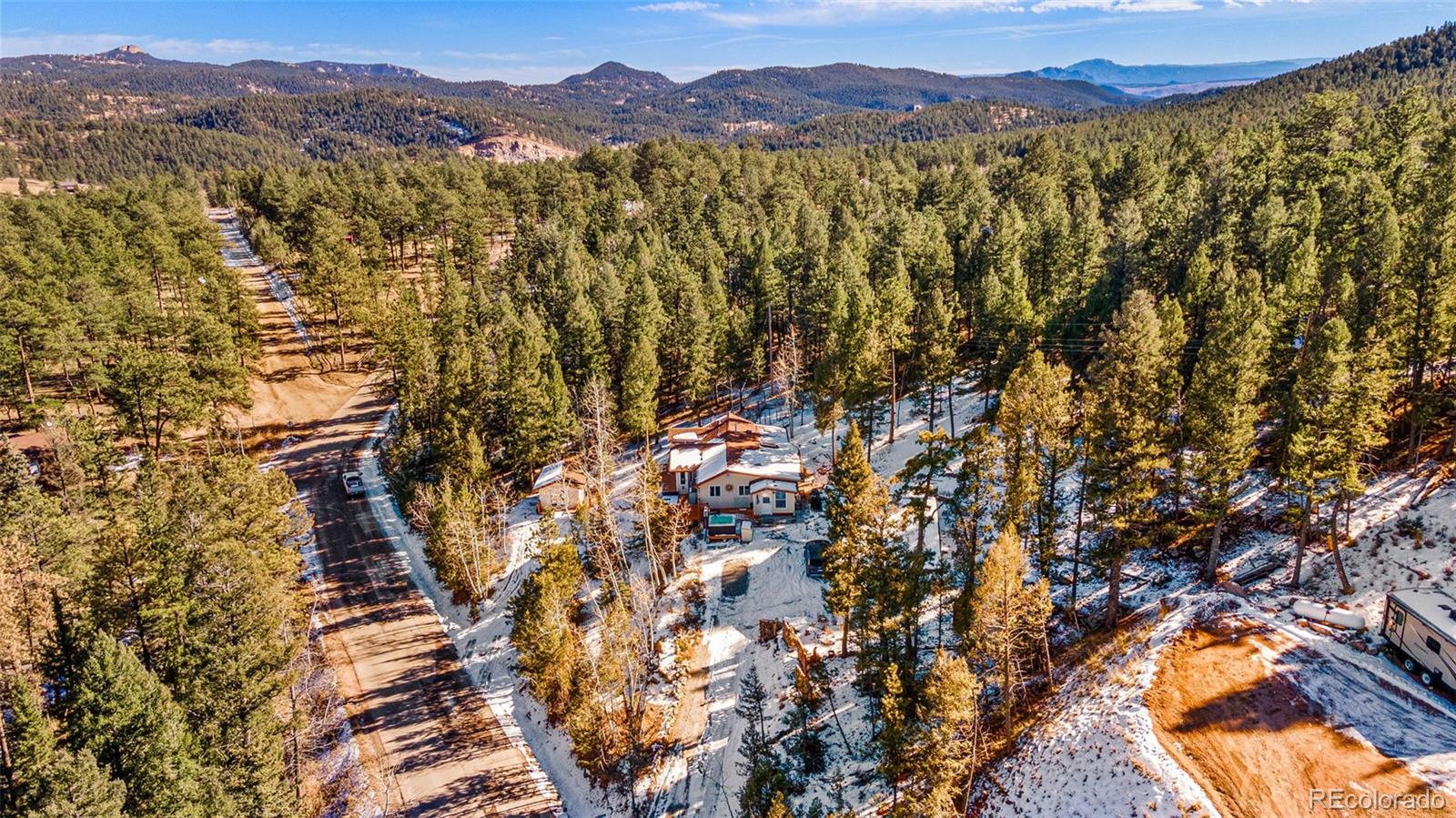33782 Nova Road Pine, CO 80470 - Photo 42 of 50 a view of a city with mountain