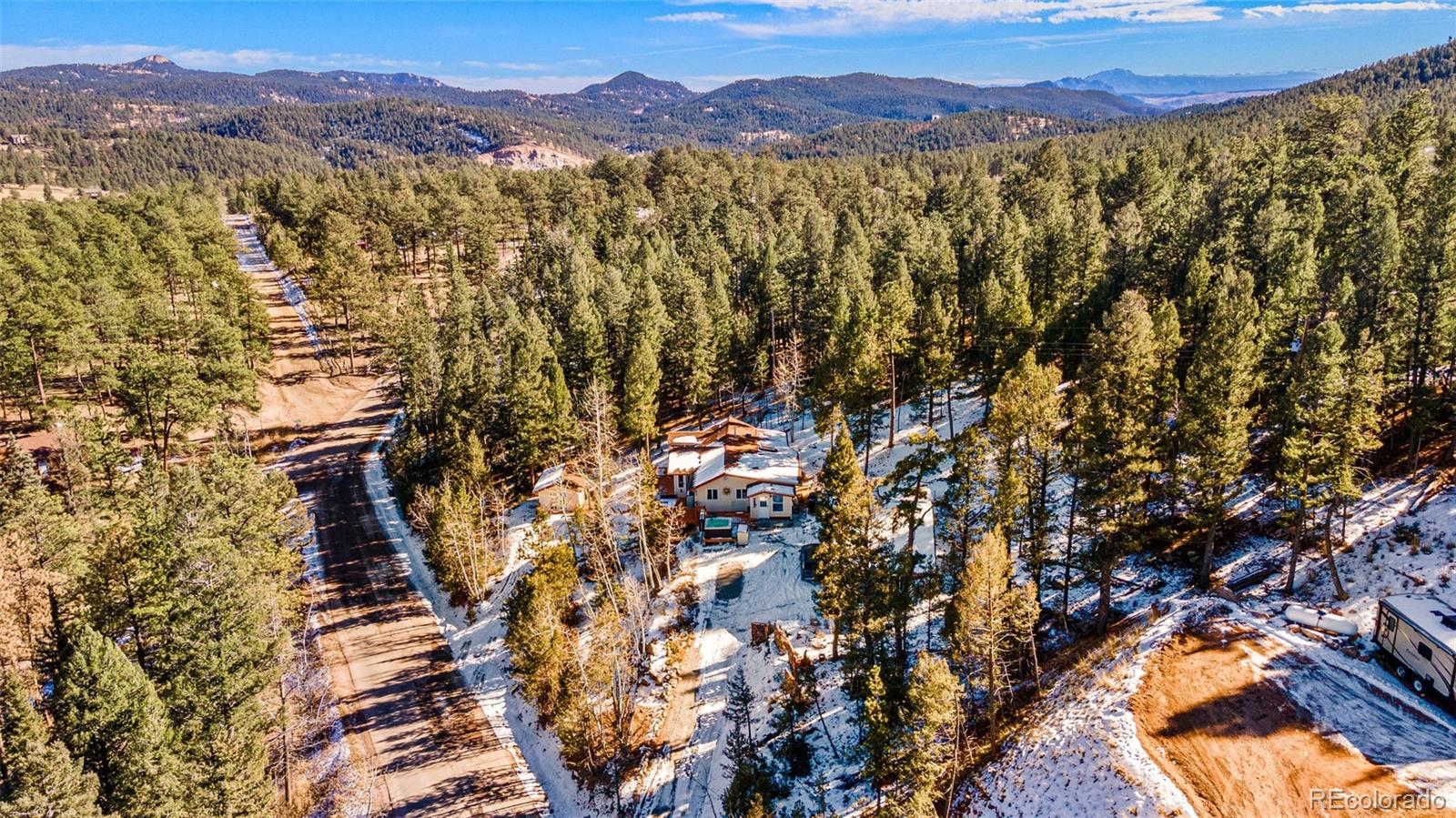 33782 Nova Road Pine, CO 80470 - Photo 43 of 50 a view of a city with mountain