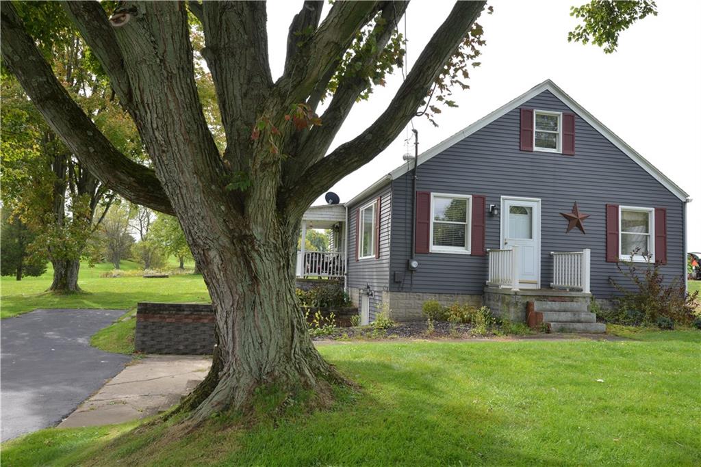 775 Claypoole Road Worthington, PA 16262 - Photo 1 of 18 a front view of a house with garden