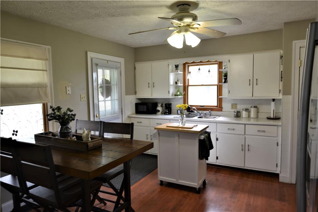 775 Claypoole Road Worthington, PA 16262 - Photo 4 of 18 a kitchen with a chandelier furniture and a stove