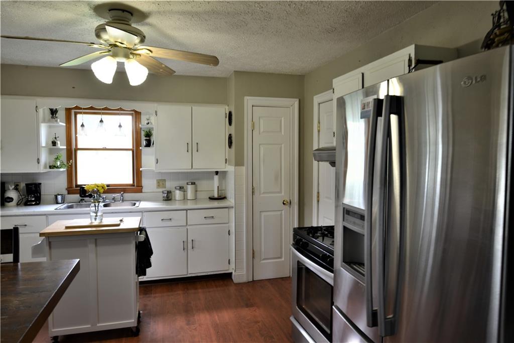 775 Claypoole Road Worthington, PA 16262 - Photo 5 of 18 a kitchen with stainless steel appliances a sink stove and refrigerator