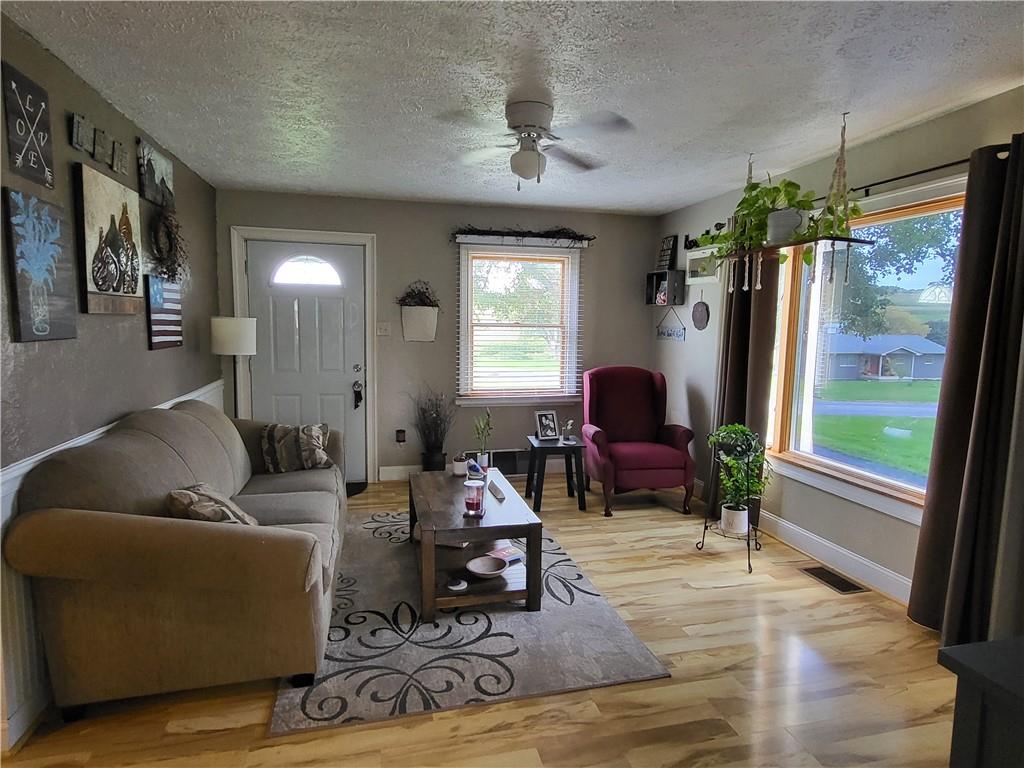 775 Claypoole Road Worthington, PA 16262 - Photo 7 of 18 a living room with furniture and a large window