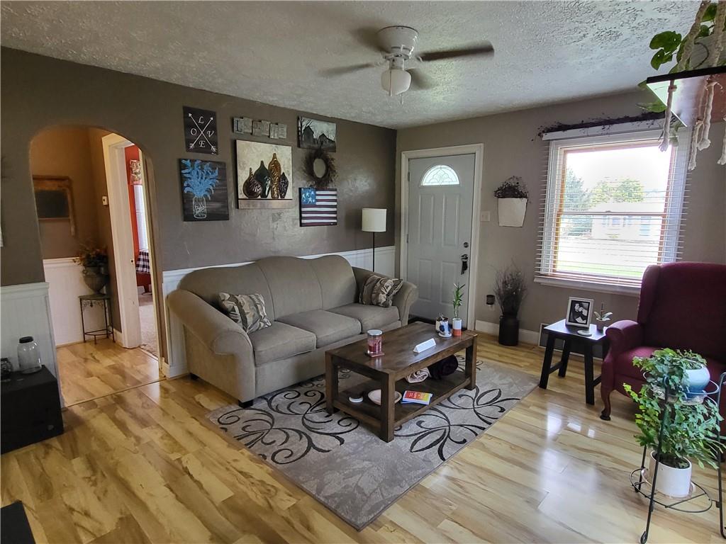 775 Claypoole Road Worthington, PA 16262 - Photo 9 of 18 a living room with furniture and wooden floor