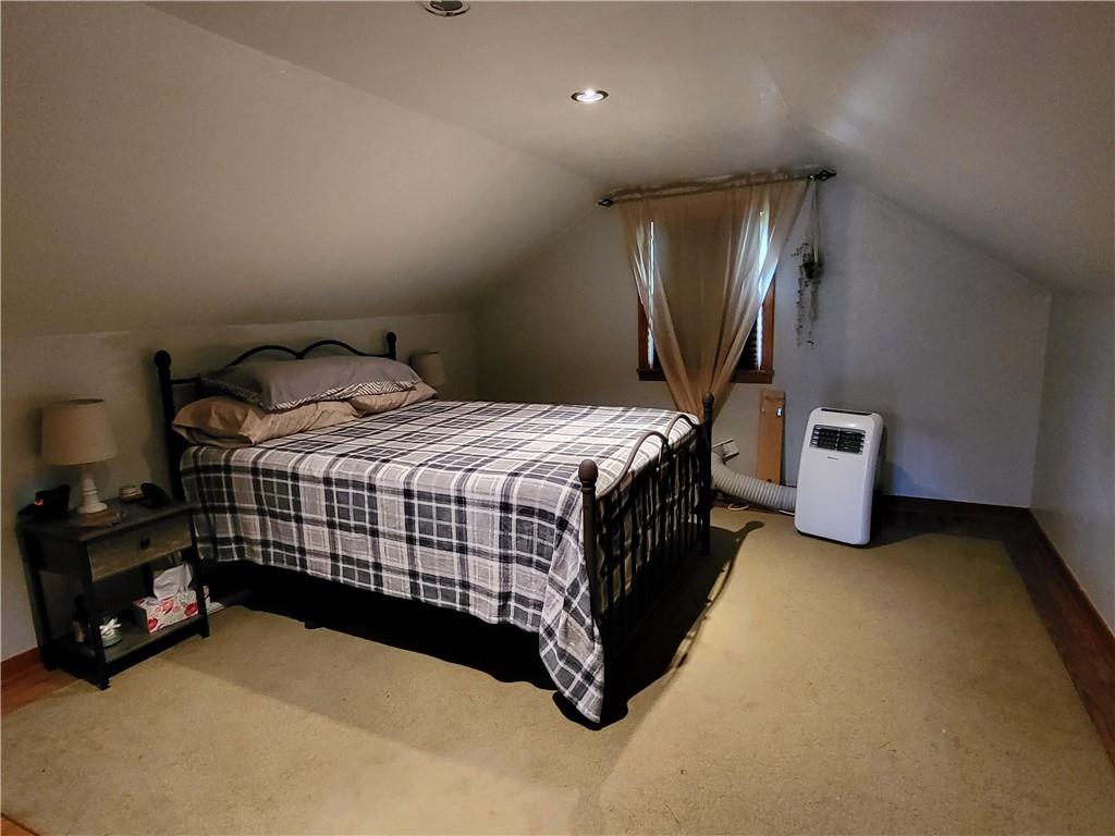 775 Claypoole Road Worthington, PA 16262 - Photo 10 of 18 a bedroom with a bed and a night stand