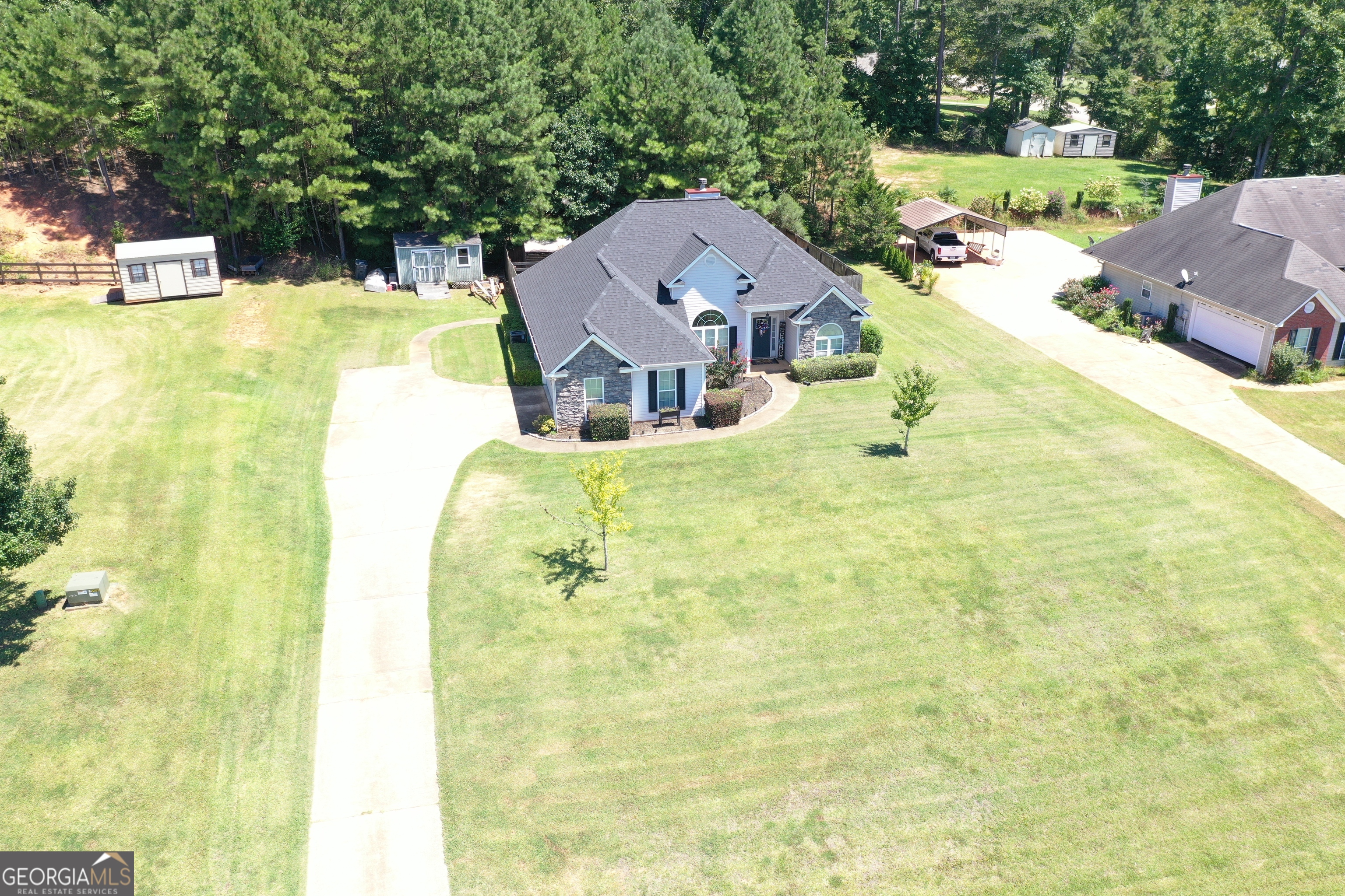 229 John Lovelace Road LaGrange, GA 30241 - Photo 47 of 59 a view of a house with a swimming pool