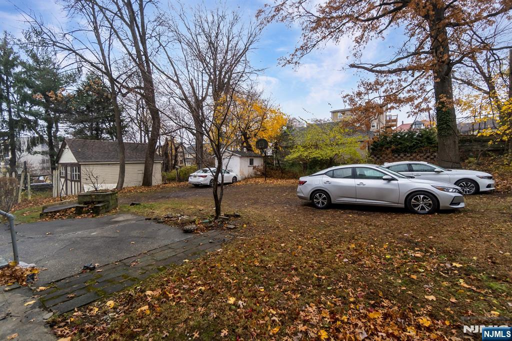 467 Fairview Avenue Orange, NJ 07050 - Photo 18 of 18 a view of car parked on the side of a road