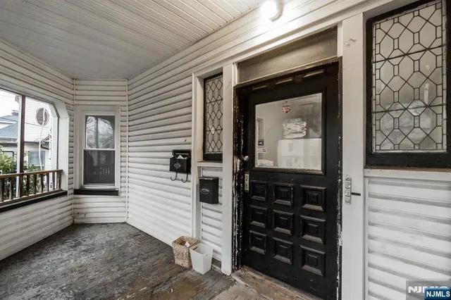 a view of a entryway door front of house