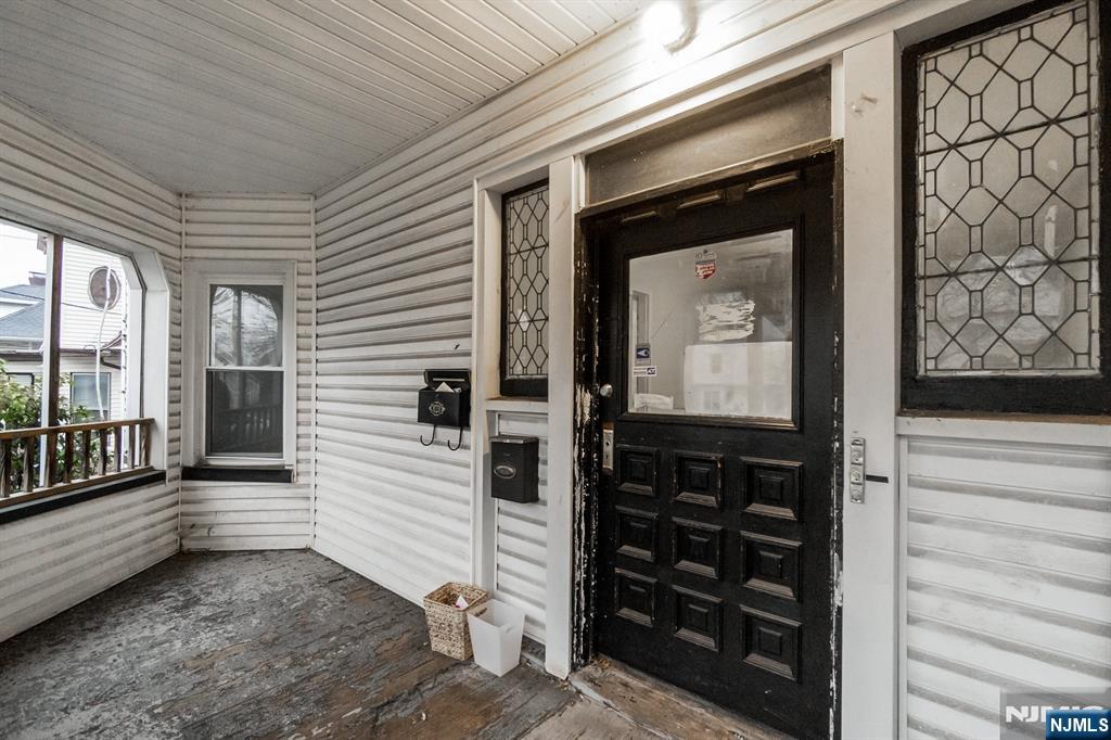 467 Fairview Avenue Orange, NJ 07050 - Photo 3 of 18 a view of a entryway door front of house