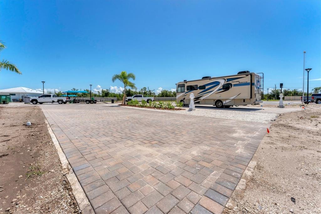 9001 Gasparilla Road, Unit 22 Placida, FL 33947 - Photo 24 of 77 a view of car parked on the side of the road