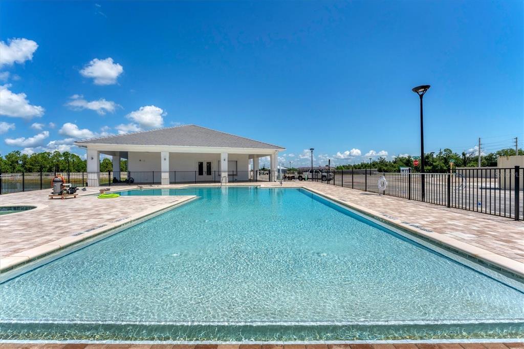 9001 Gasparilla Road, Unit 22 Placida, FL 33947 - Photo 48 of 77 a view of a house with a swimming pool