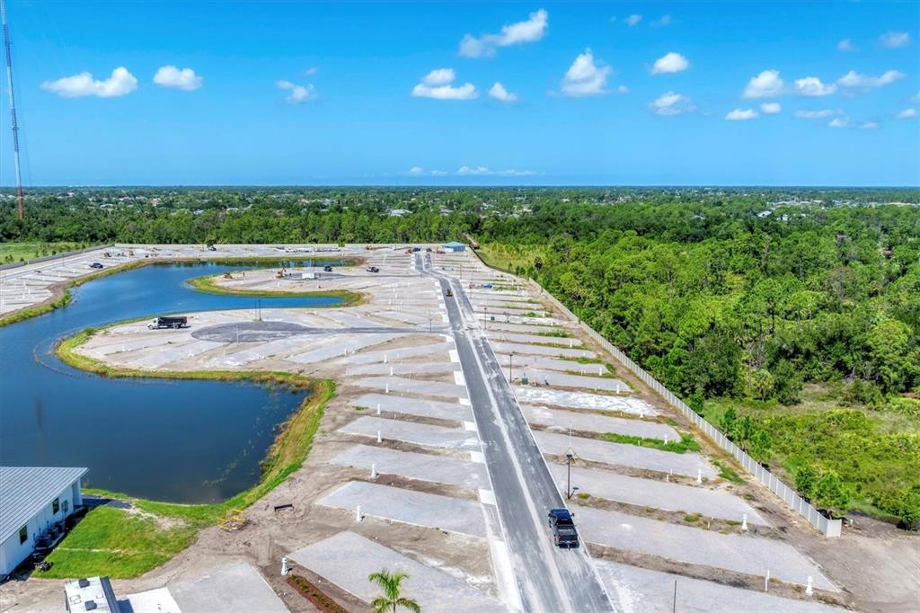 9001 Gasparilla Road, Unit 22 Placida, FL 33947 - Photo 61 of 77 a view of a swimming pool is middle in the backyard