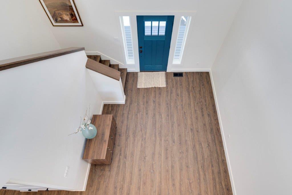 8962 Southwest Copley Road Powell Butte, OR 97753 - Photo 29 of 46 Looking down to the entry hall from above