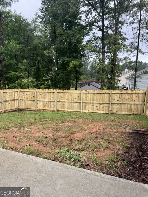 398 Riley Circle Northwest Milledgeville, GA 31061 - Photo 13 of 15 a view of backyard with green space