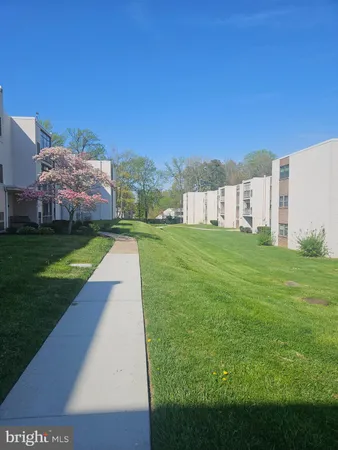 a view of a house with a park