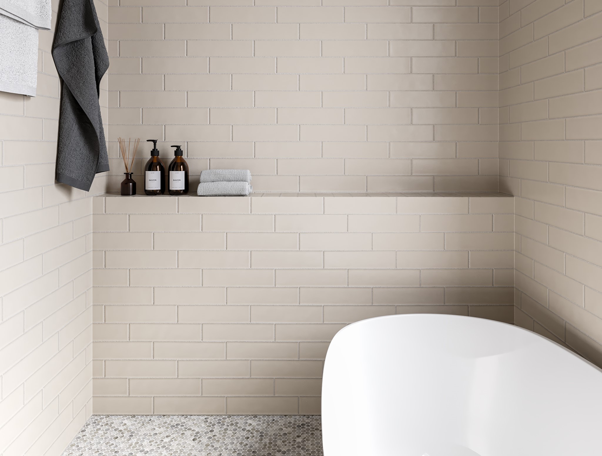 3911 Tulane Street, Unit B Houston, TX 77018 - Photo 34 of 37 Elegant primary bathroom featuring sleek, neutral-toned tiles, a luxurious soaking tub, and stylish shelving for a spa-like retreat.