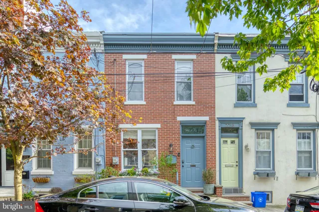 a front view of a building with street