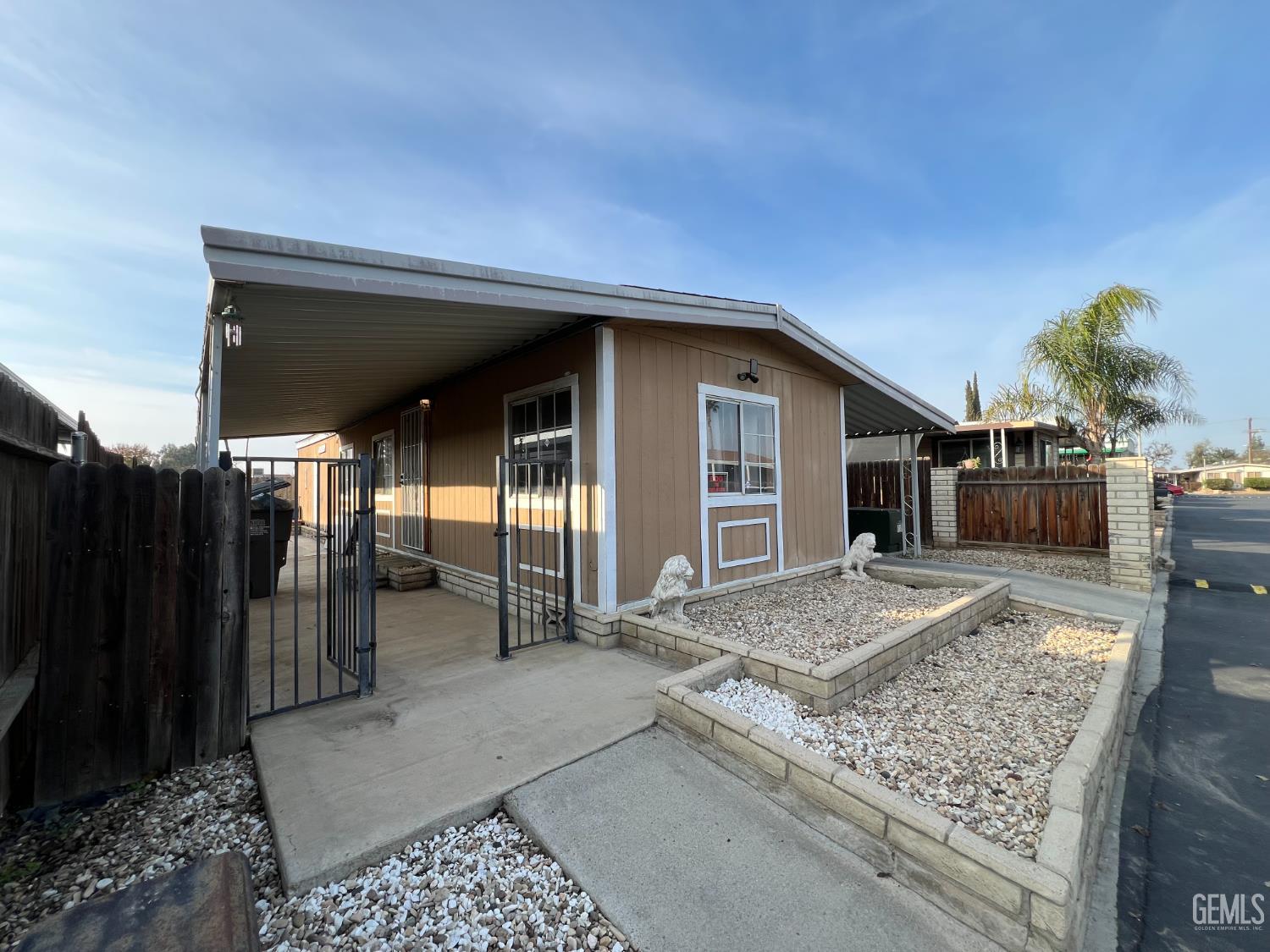 Undisclosed Address Bakersfield, CA 93309 - Photo 2 of 14 a view of a house with backyard