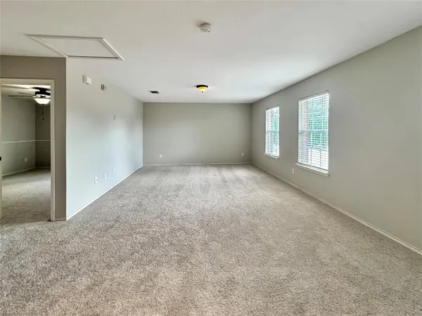 en empty room with windows