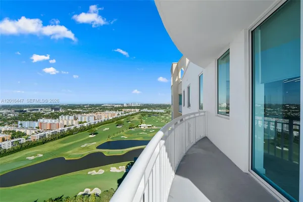a balcony with view of city