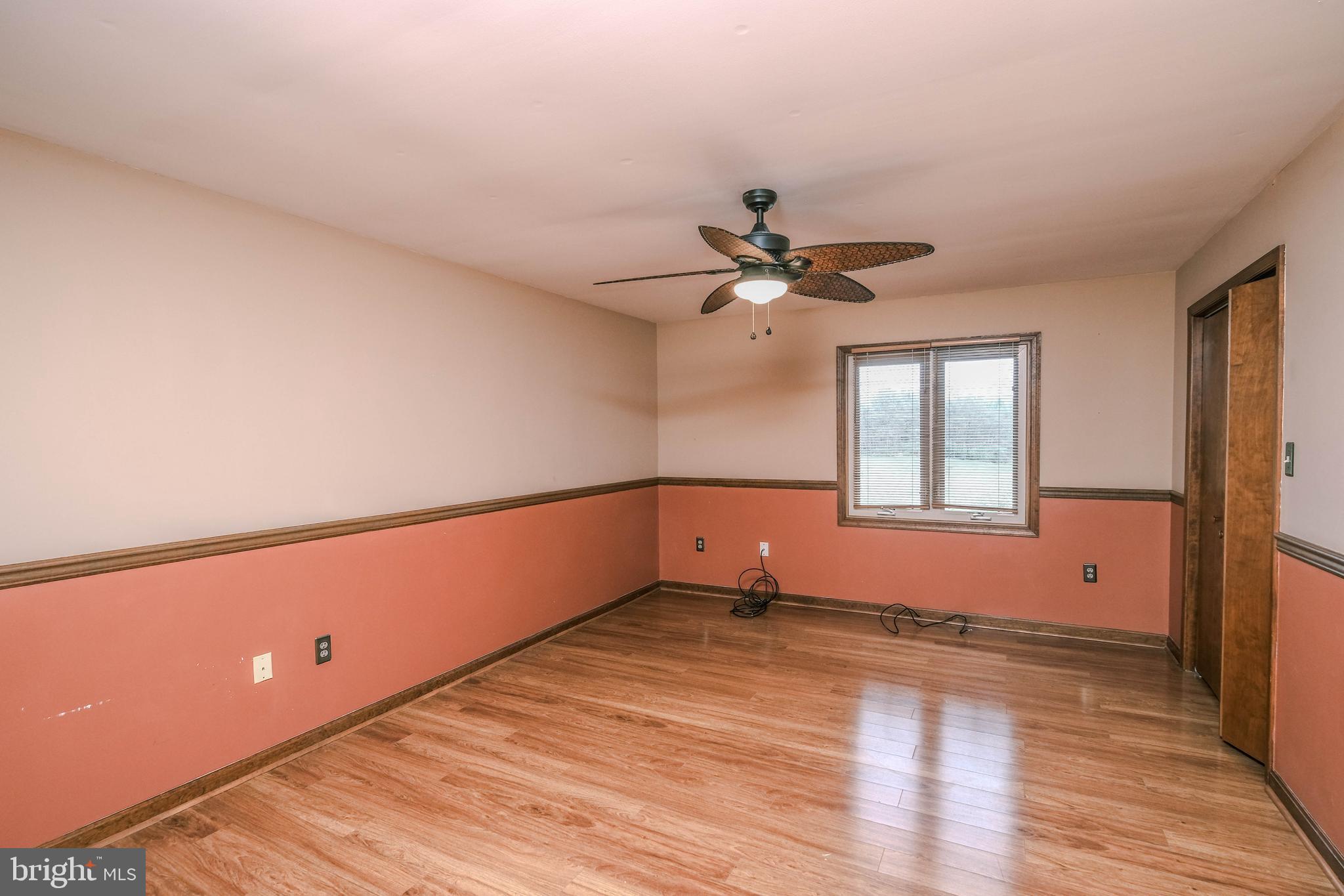 225 Bowling Green Road Front Royal, VA 22630 - Photo 40 of 77 wooden floor in an empty room with a window