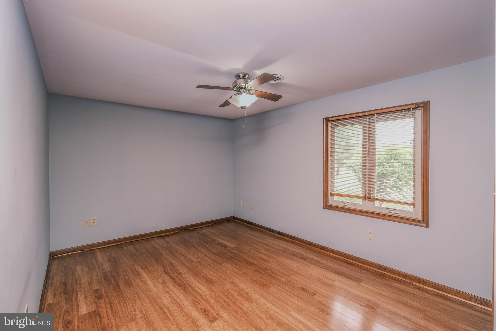 225 Bowling Green Road Front Royal, VA 22630 - Photo 43 of 77 wooden floor in an empty room with a window