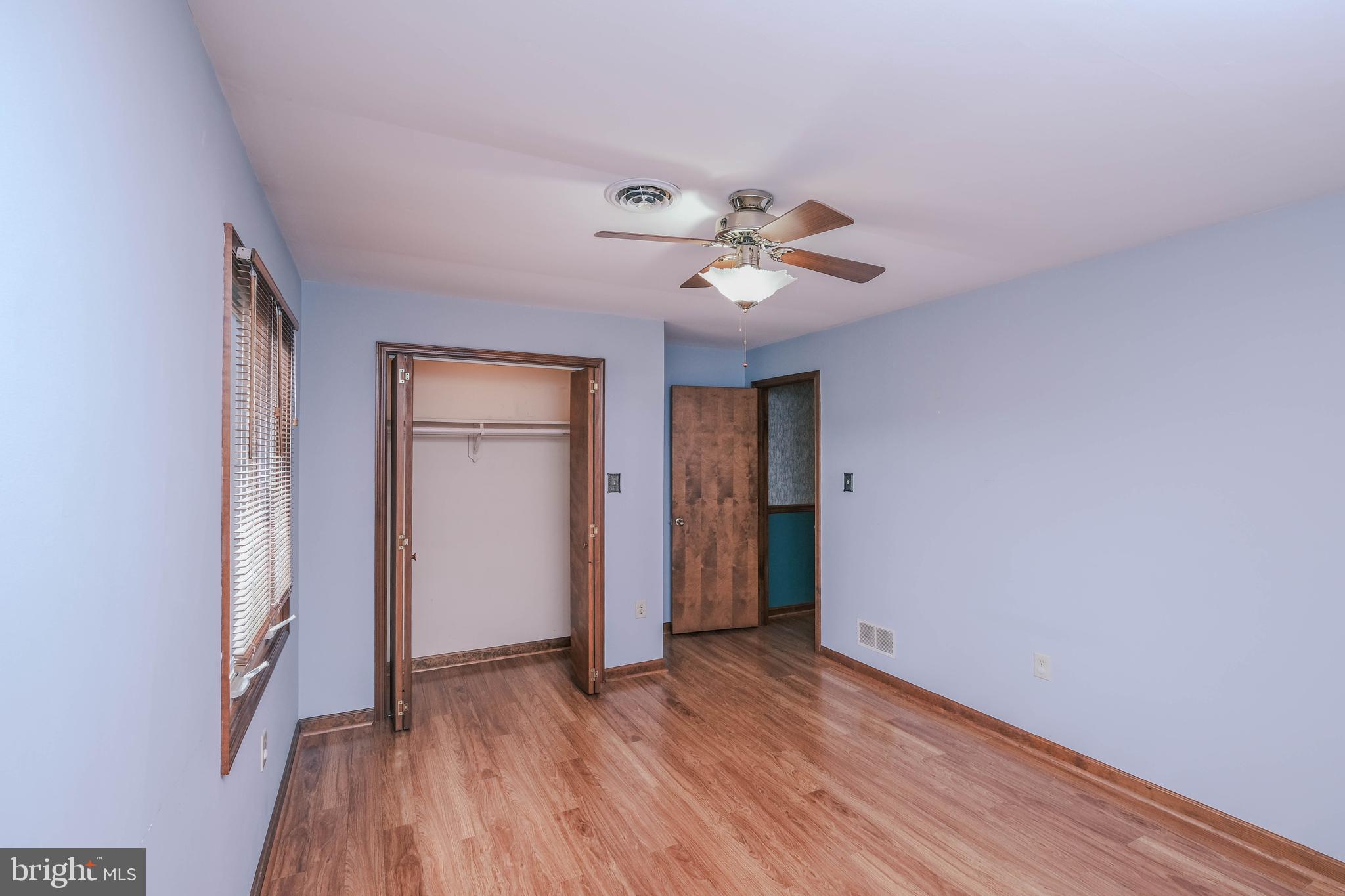 225 Bowling Green Road Front Royal, VA 22630 - Photo 45 of 77 a view of a room with wooden floor and window