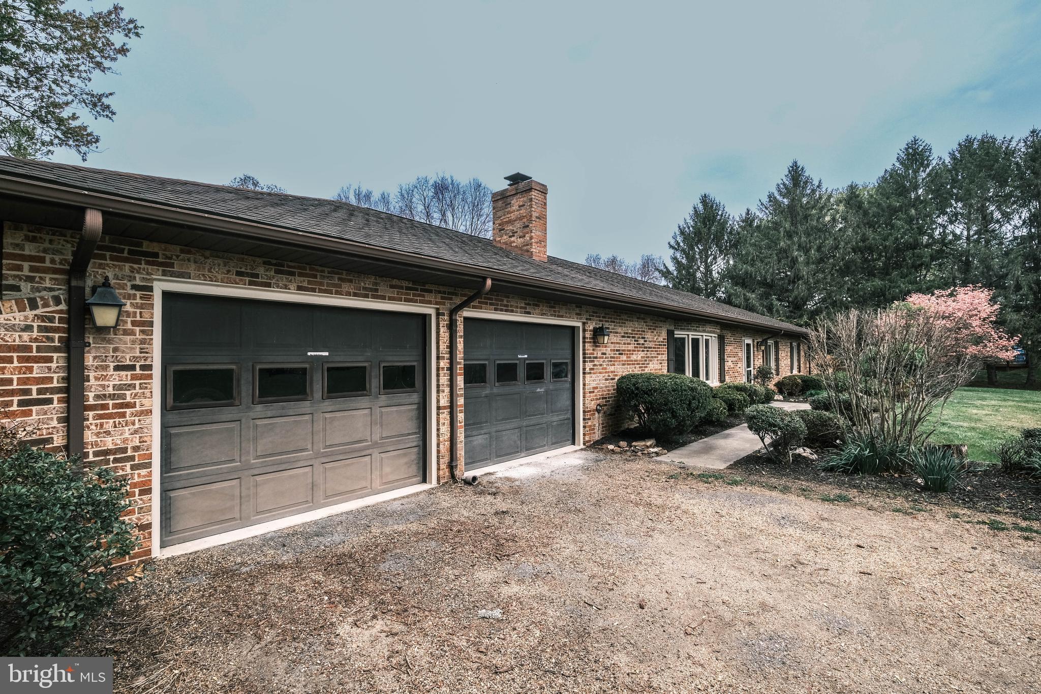 225 Bowling Green Road Front Royal, VA 22630 - Photo 54 of 77 a front view of a house with a yard