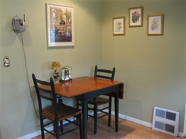 8 Tanbark Road Sudbury, MA 01776 - Photo 16 of 27 a dining room with a table and chairs