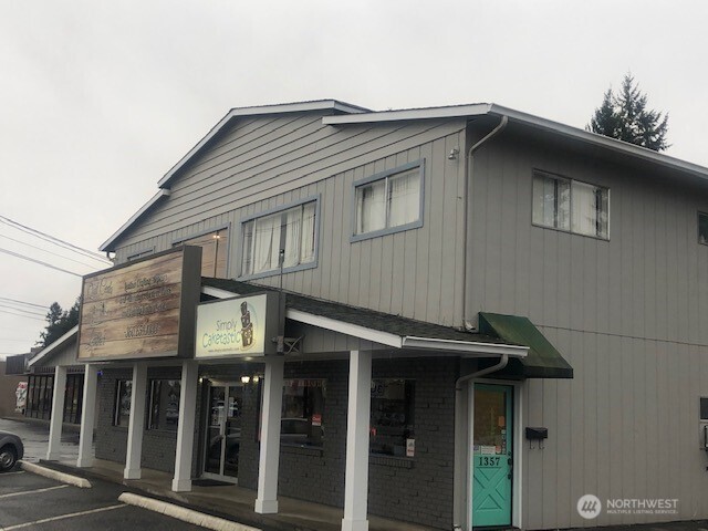 1355 State Avenue, Unit B Marysville, WA 98270 - Photo 2 of 10 a view of a house with retail shops