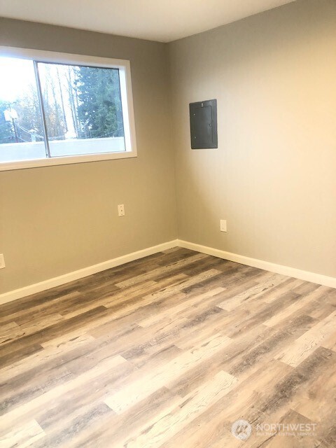 1355 State Avenue, Unit B Marysville, WA 98270 - Photo 4 of 10 a view of a room with an empty space and a window