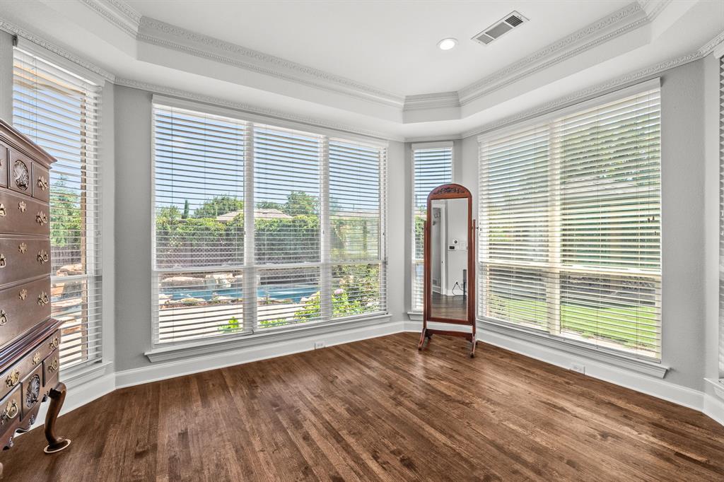 1101 Trail Ridge Drive McKinney, TX 75072 - Photo 16 of 37 a view of a room with wooden floor and balcony with wooden floor