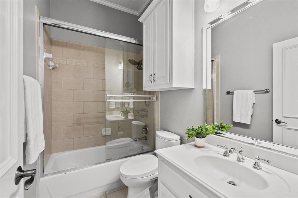 1101 Trail Ridge Drive McKinney, TX 75072 - Photo 27 of 37 a bathroom with a sink toilet and shower