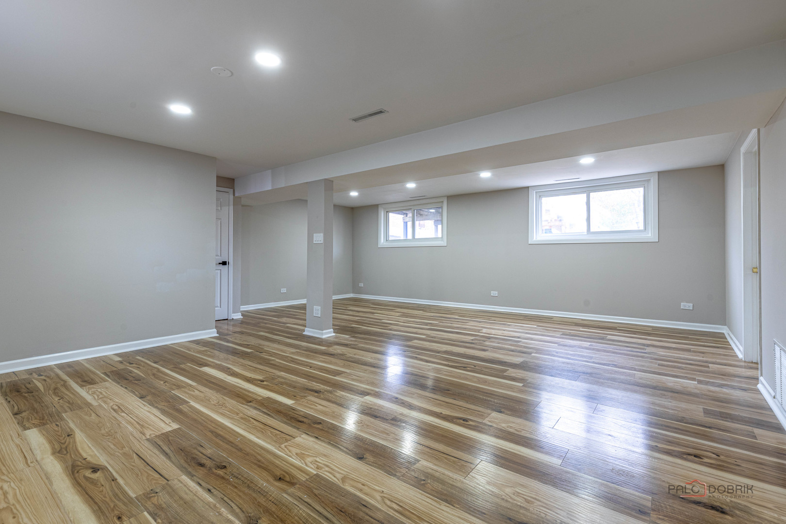 1096 Beechwood Road Buffalo Grove, IL 60089 - Photo 20 of 26 a view of empty room with wooden floor