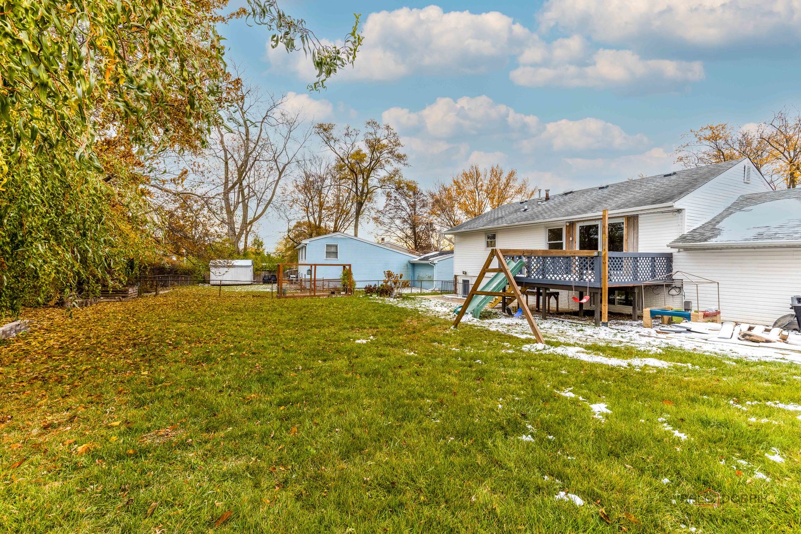 1096 Beechwood Road Buffalo Grove, IL 60089 - Photo 25 of 26 a view of a house with pool and sitting area