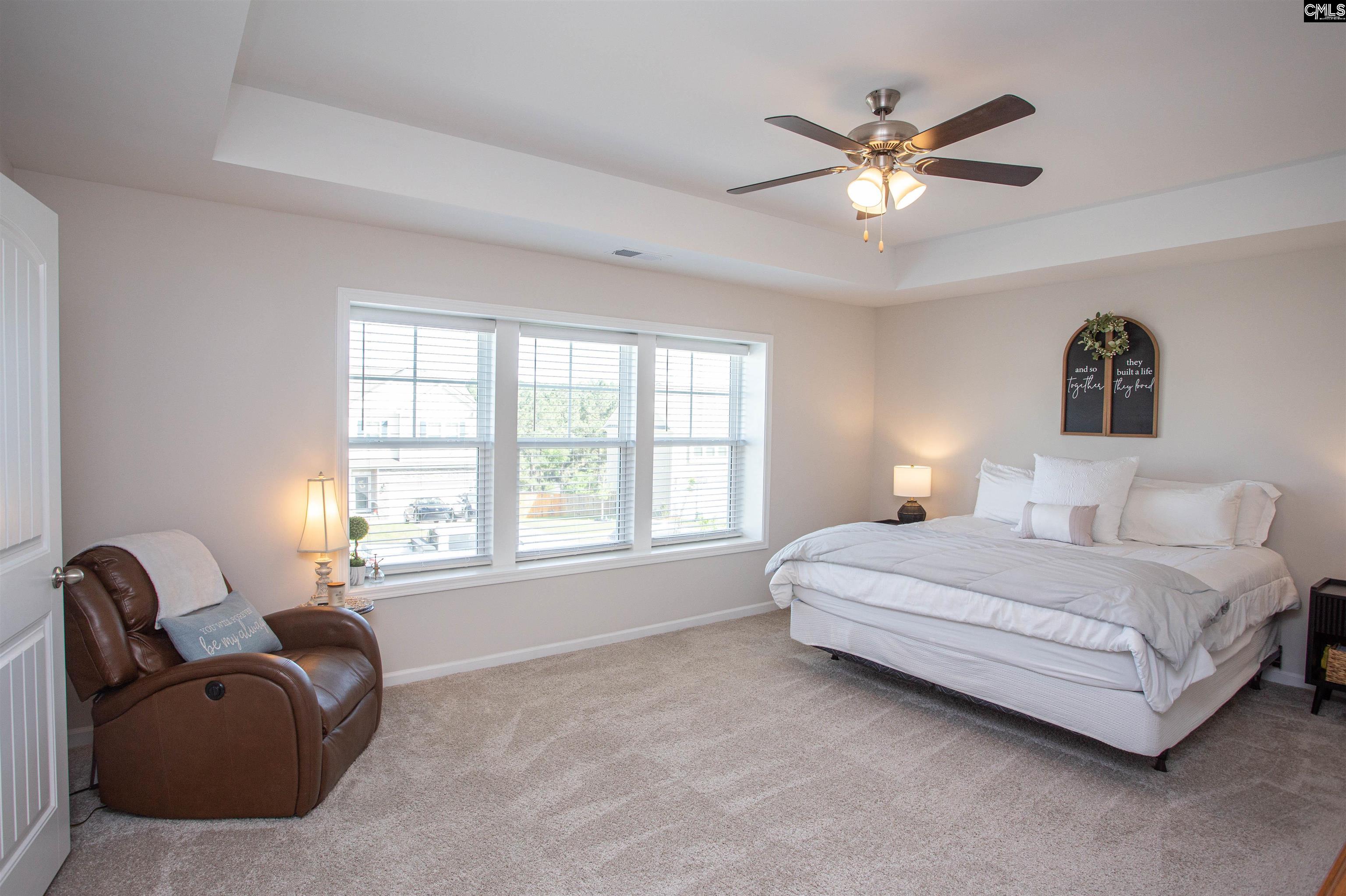 272 Shadowbrook Way Camden, SC 29020 - Photo 23 of 43 a spacious bedroom with a bed and window