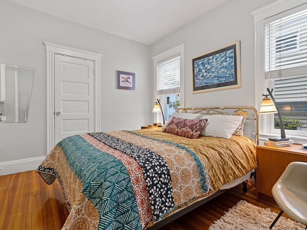 68 Parkton Road, Unit 1 Boston, MA 02130 - Photo 14 of 22 a bedroom with bed and window