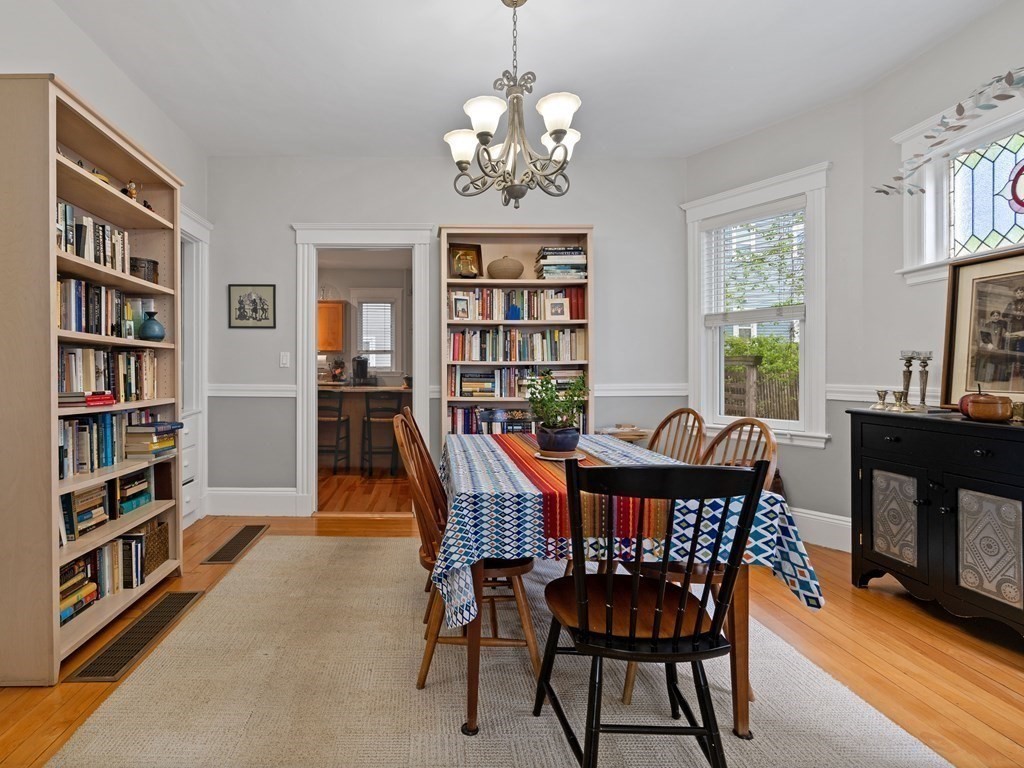 68 Parkton Road, Unit 1 Boston, MA 02130 - Photo 6 of 22 a view of a dining room with furniture window and wooden floor