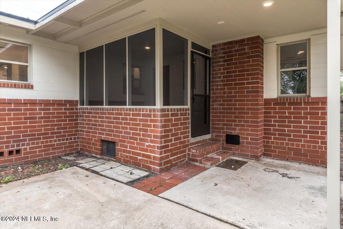 6824 E Road Jacksonville, FL 32216 - Photo 28 of 32 Screened Porch and covered Patio