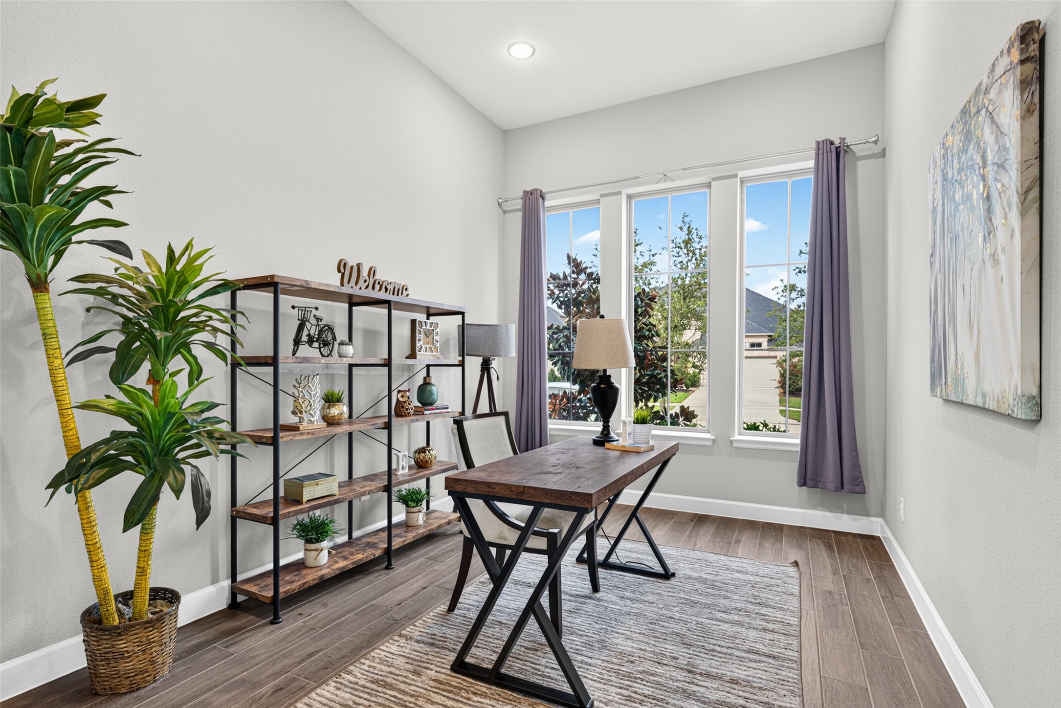 4207 Ana Ridge Lane Fulshear, TX 77441 - Photo 2 of 37 Sun-drenched home study with wide windows—the perfect cozy spot for working from home or quiet reading sessions.