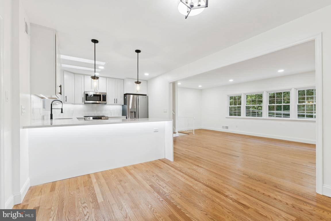 3209 Military Road Arlington, VA 22207 - Photo 15 of 45 a view of kitchen with wooden floor