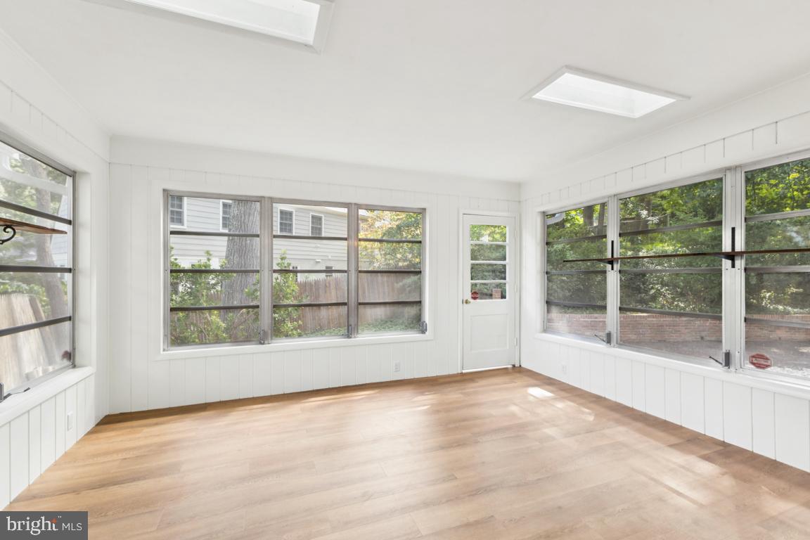 3209 Military Road Arlington, VA 22207 - Photo 17 of 45 a view of an empty room with a window