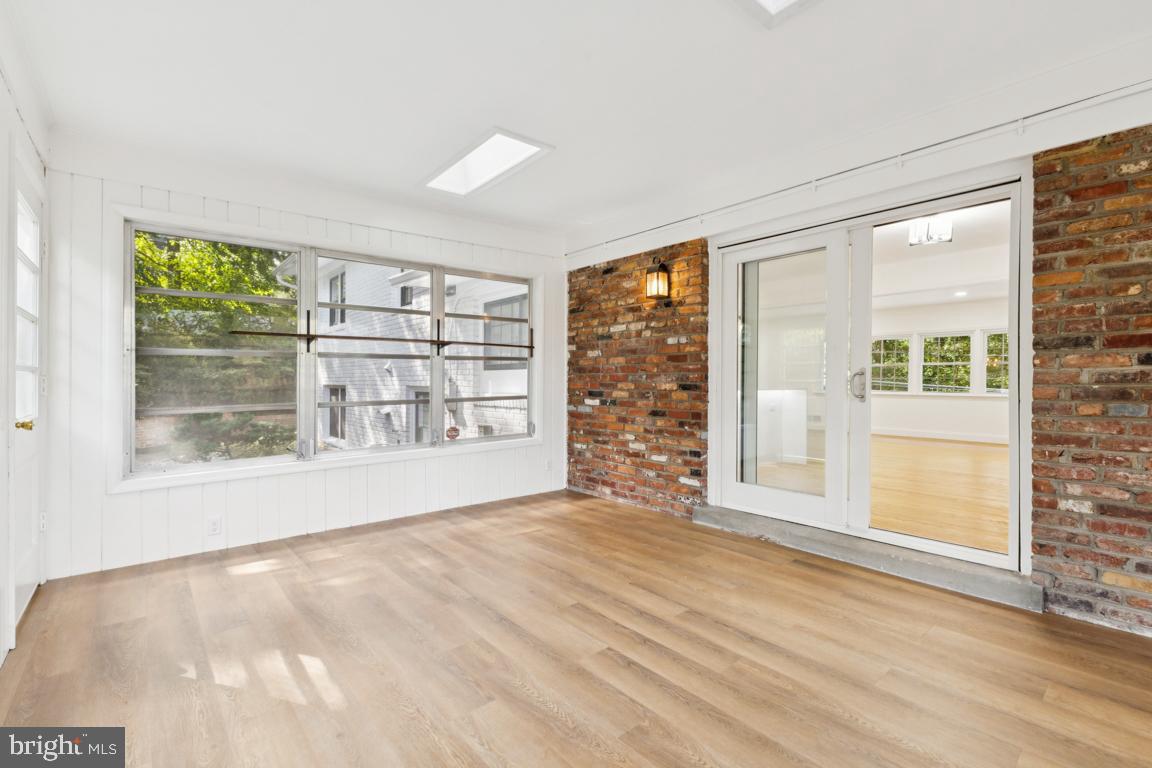 3209 Military Road Arlington, VA 22207 - Photo 18 of 45 a view of an empty room with a window
