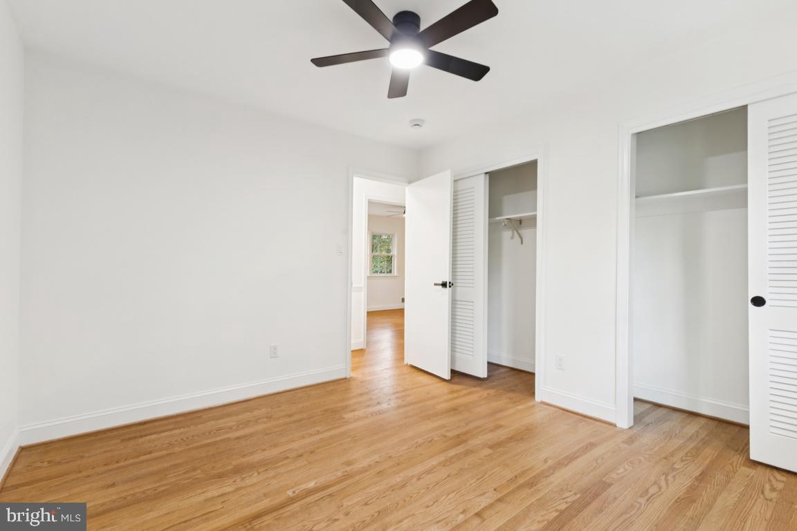 3209 Military Road Arlington, VA 22207 - Photo 21 of 45 a view of an empty room with wooden floor