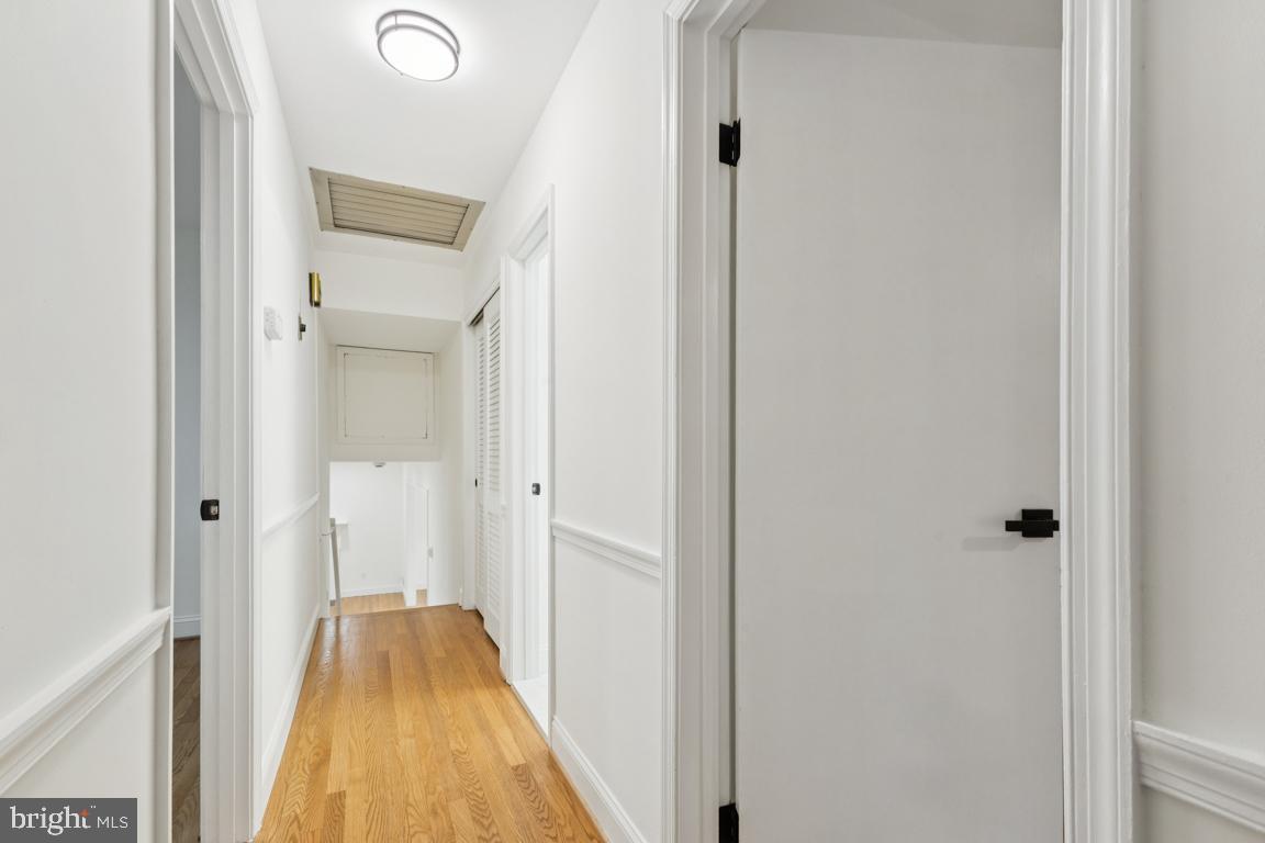 3209 Military Road Arlington, VA 22207 - Photo 28 of 45 a view of a bathroom with a sink and a mirror