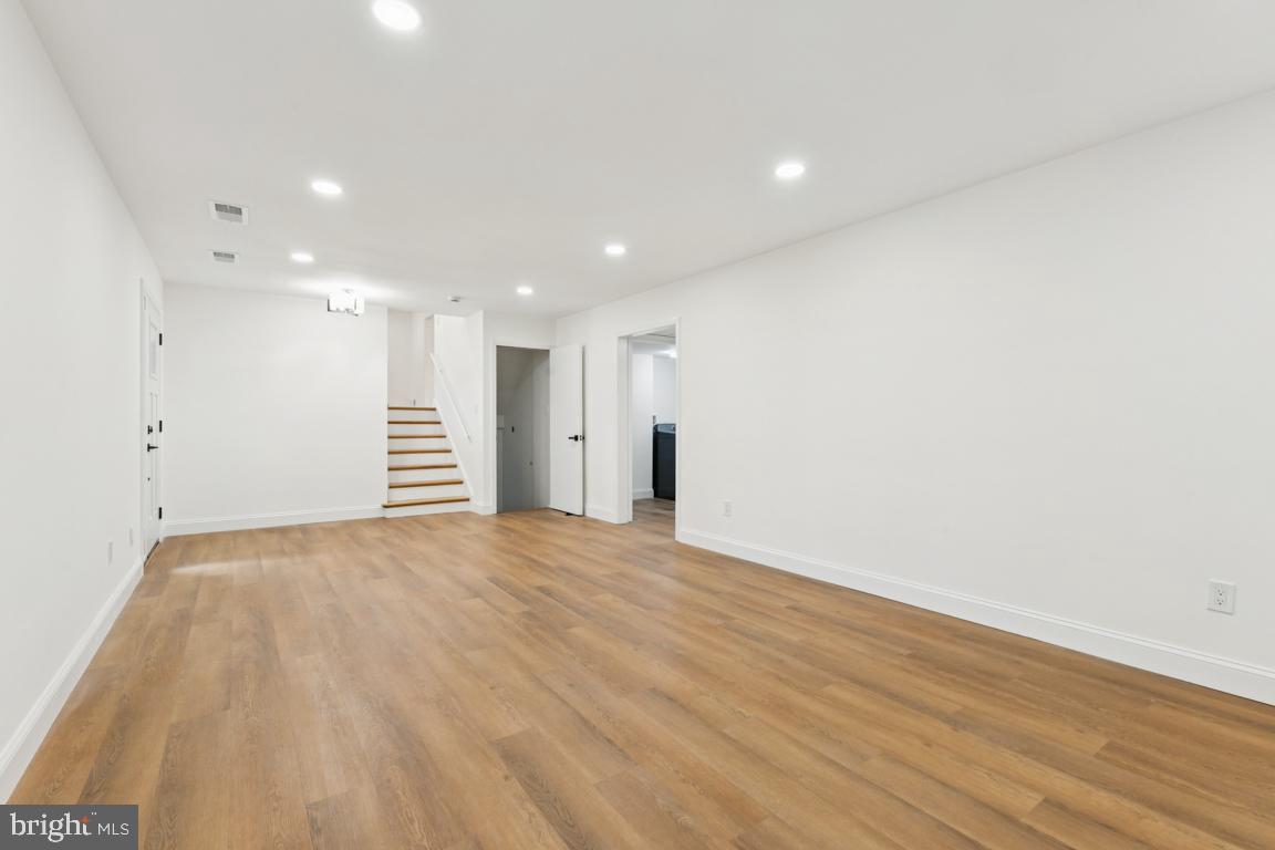 3209 Military Road Arlington, VA 22207 - Photo 30 of 45 a view of an empty room with wooden floor