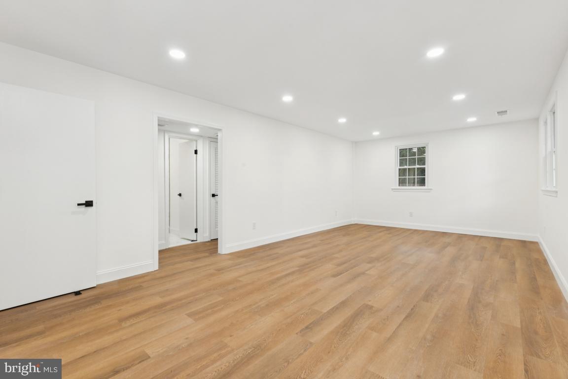 3209 Military Road Arlington, VA 22207 - Photo 33 of 45 a view of an empty room with wooden floor